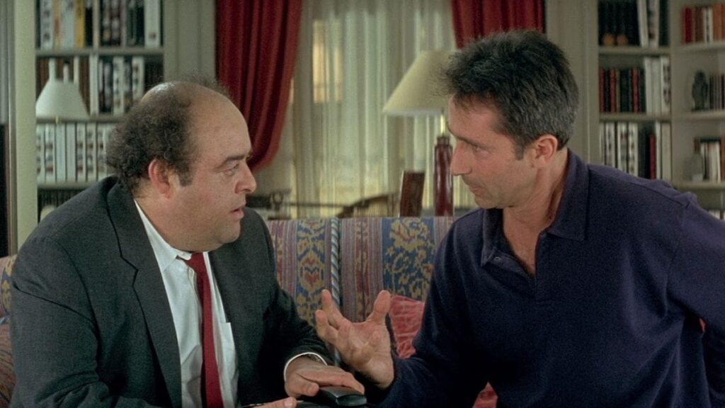 François Pignon (Jacques Villeret) et Pierre Brochant (Thierry Lhermitte) dans Le Dîner de Cons.