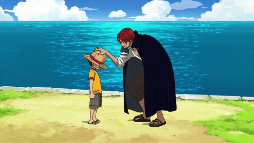 Shanks donnant son chapeau de paille à Luffy dans l'anime One Piece