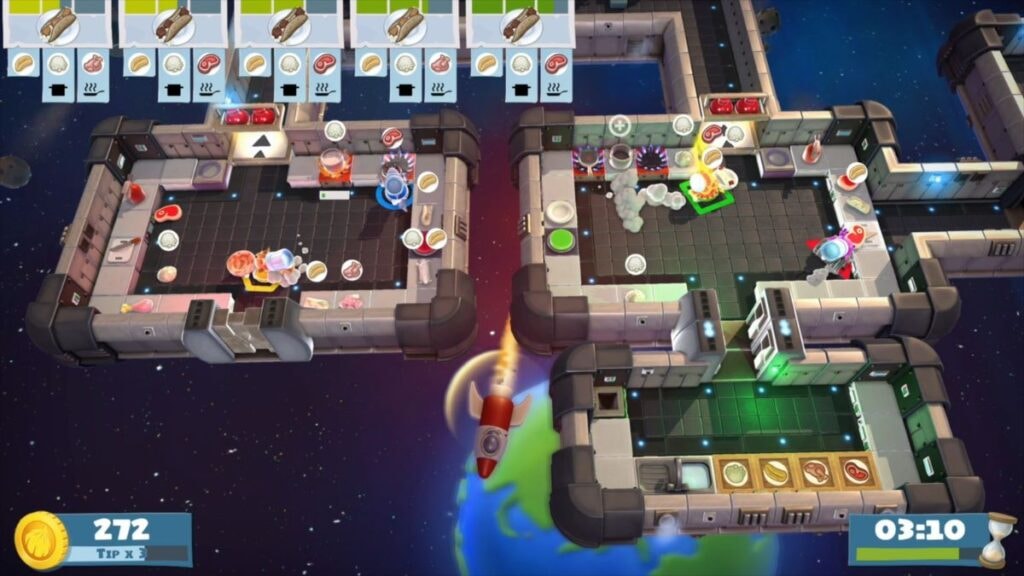 Des joueurs préparant une commande dans un restaurant situé dans l'espace dans le jeu vidéo Overcooked! All You Can Eat